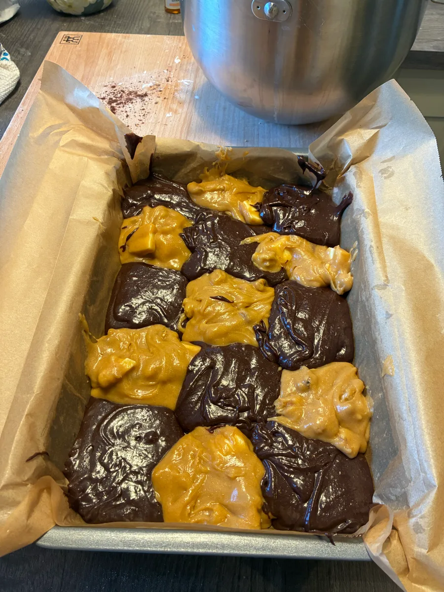 Alternate scoops of batter
