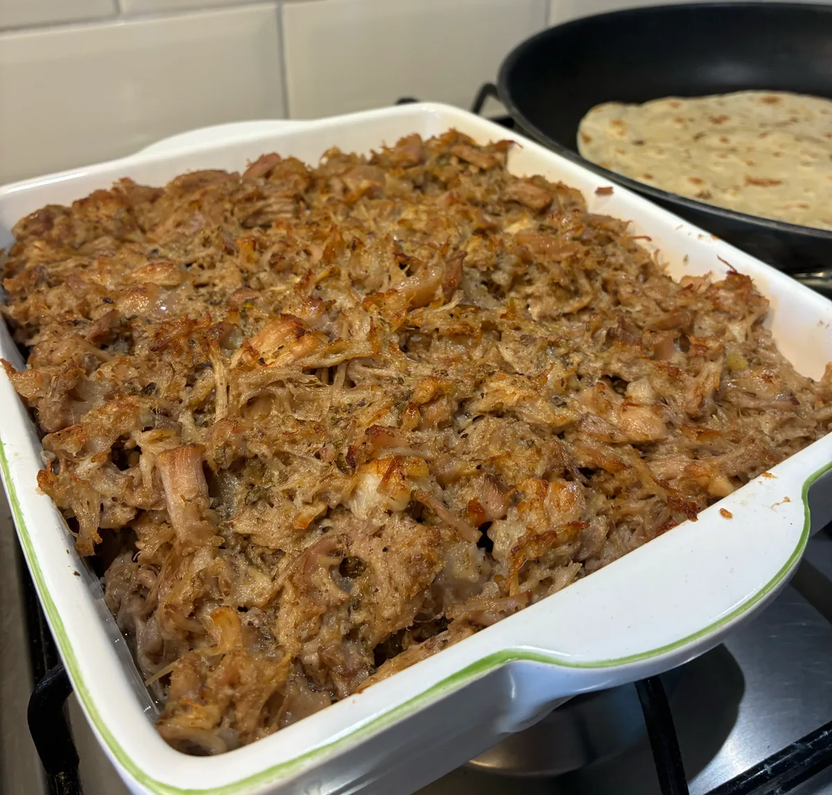Shredded carnitas on the tray